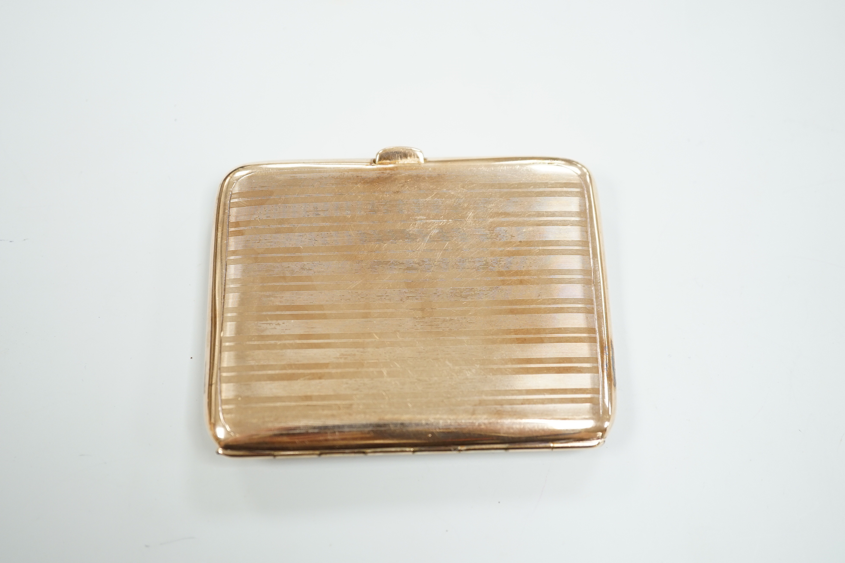 A George V 9ct gold cigarette case, 82mm